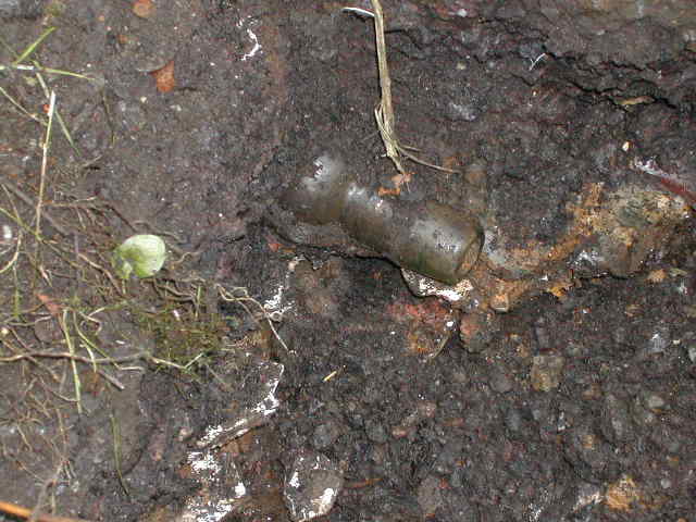 A bullet stopper appears from the ash