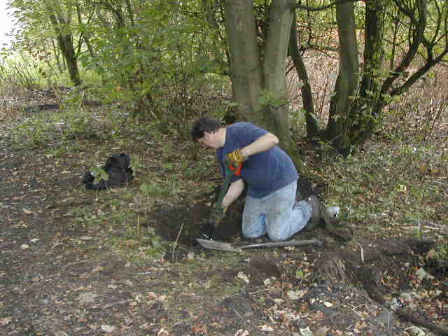 Stephen digging away (& praying for a complete bottle?)