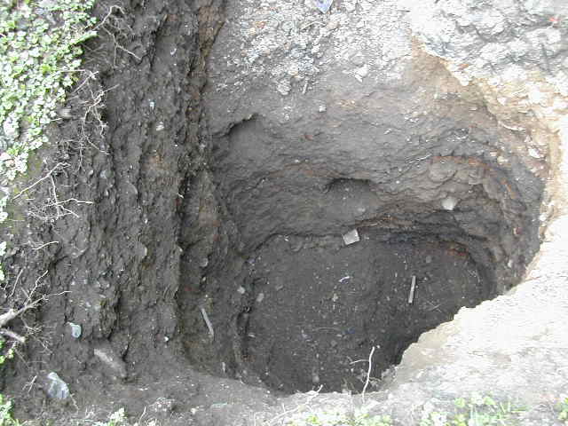 Footholds in the compacted ash for a quick climb out